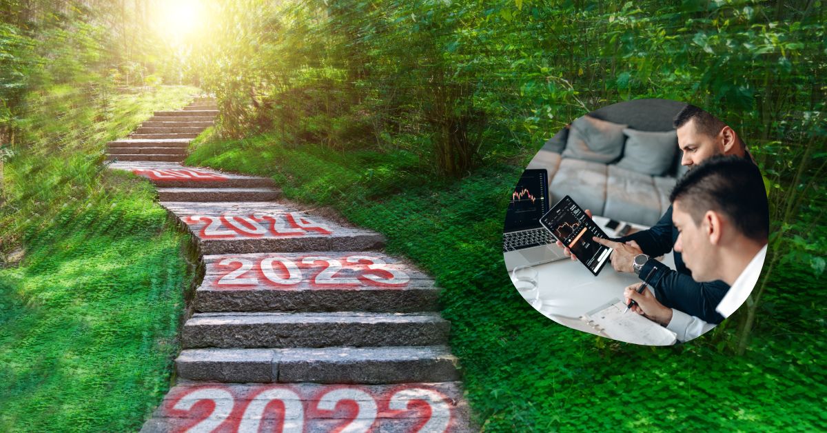 Image of steps leading up a grassy hill surrounded by trees, with the steps having the years 2022, 2023, 2024 and 2025 written on them. On the side of the image is an insert of two professionals analyzing data.